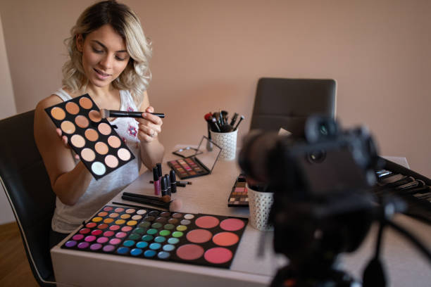 istock Beautiful young woman vlogging about cosmetics 1157497353