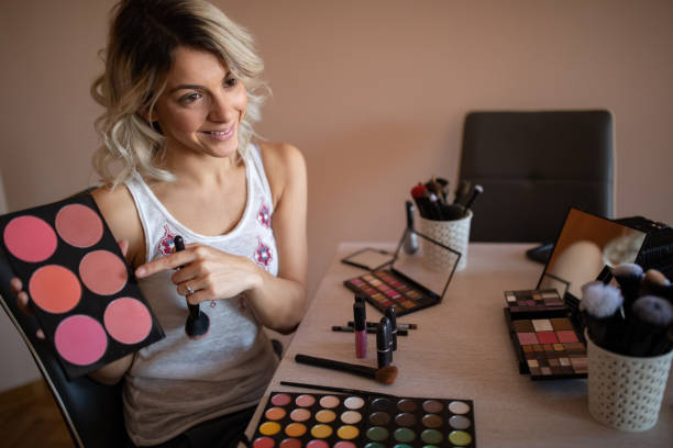 istock Beautiful young woman vlogging about cosmetics 1157497385
