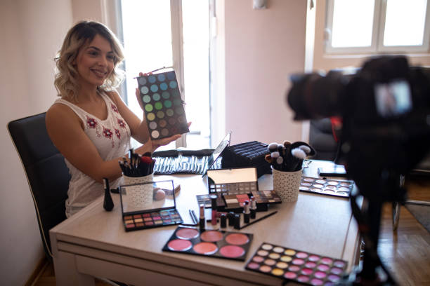 istock Beautiful young woman vlogging about cosmetics 1157497394