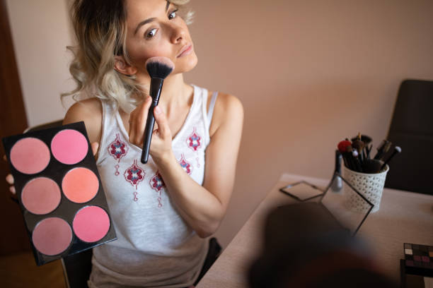 istock Beautiful young woman vlogging about cosmetics 1157497981