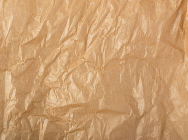 istock Crumpled Craft Paper Top View with Copy Space for Collages 1157502040