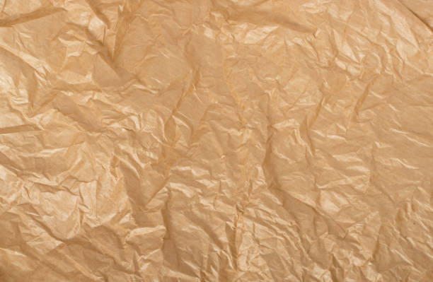 istock Crumpled Craft Paper Top View with Copy Space for Collages 1157502041