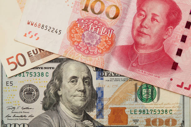 istock usd, eur and yuan bills 1157506314