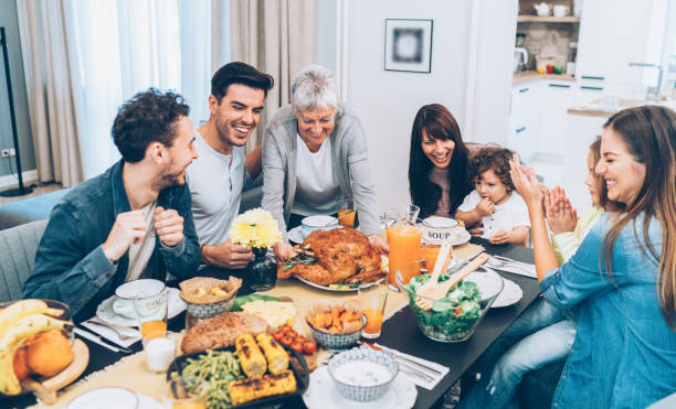 istock Senior woman serving roasted turkey 1157506519