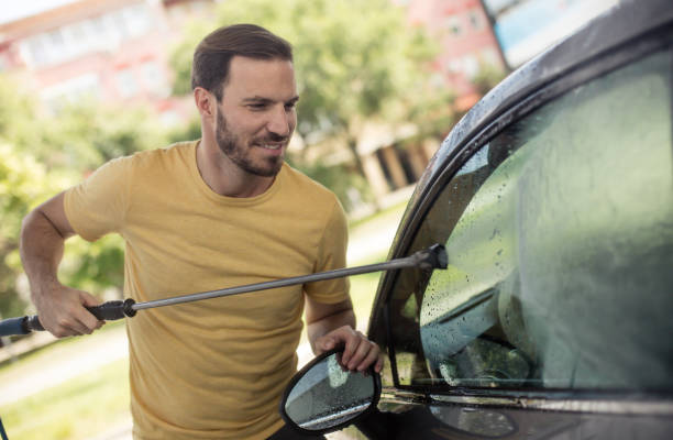 istock Rinsing the car after some heavy washing. 1157512378