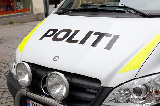 Oslo, Norway - June 20, 2019: Close-up of a Norwegian Mercedes police car hood.