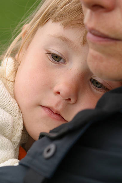 istock Mother comforting her daughter on a shoulder 115751352