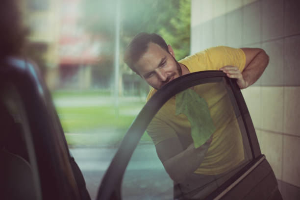istock Giving the car a good scrub. 1157515111