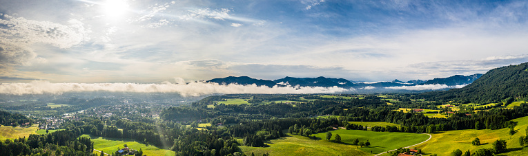 Bad Toelz Bavarian Alps. Meadows Grass and Agriculture Farmland. Isar valley. Drone Shot. June 19