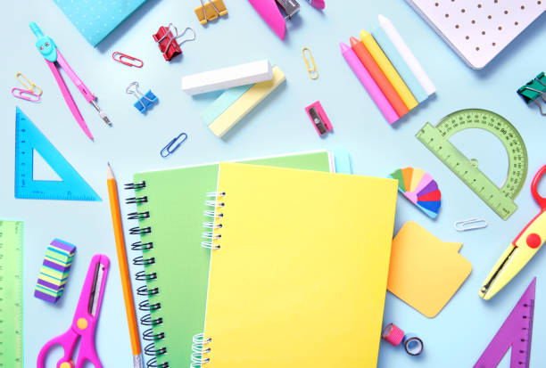 istock School supplies,office equipment on blue background. 1157518553