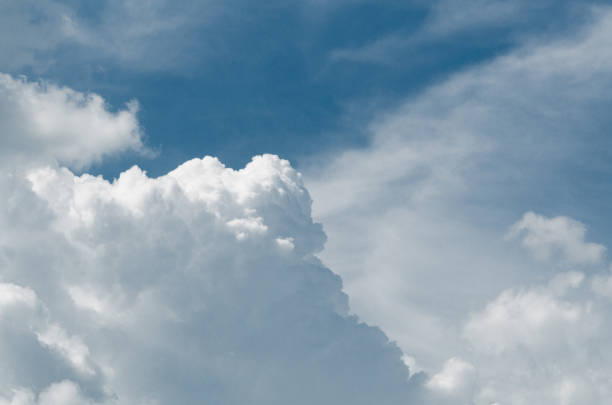 istock Incredibly wonderful lush cumulus clouds against a blue sky 1157521710