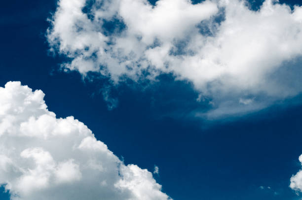 istock Incredibly wonderful lush cumulus clouds against a blue sky 1157521714