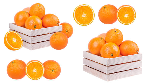 istock Oranges in a box isolated on white background with clipping path 1157521869
