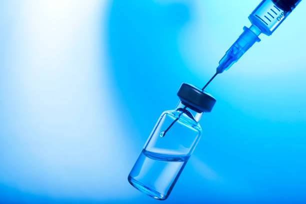 istock High Angle View Of Syringe With Medical Bottles On Table 1157524995