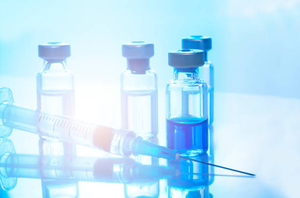 istock High Angle View Of Syringe With Medical Bottles On Table 1157524997