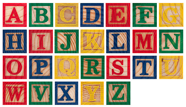 istock Wooden alphabet blocks isolated on white 115752648