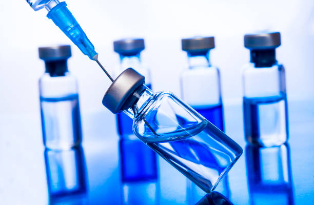 istock High Angle View Of Syringe With Medical Bottles On Table 1157527004