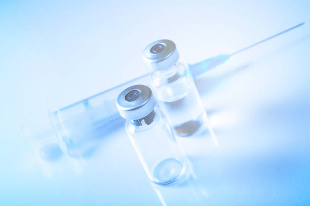 istock High Angle View Of Syringe With Medical Bottles On Table 1157528497