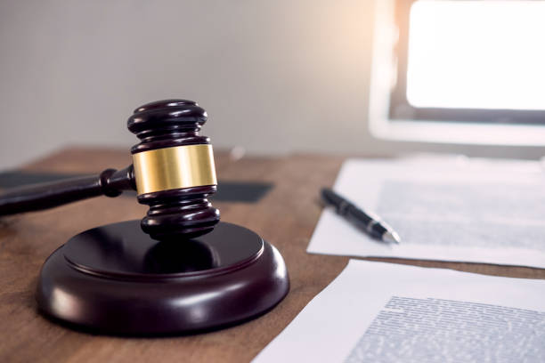 istock Close-Up Of Gavel And Papers On Courthouse Table 1157529065