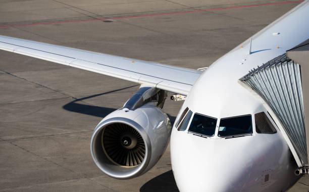 istock High Angle View Of Airplane On Airport Runway 1157530419