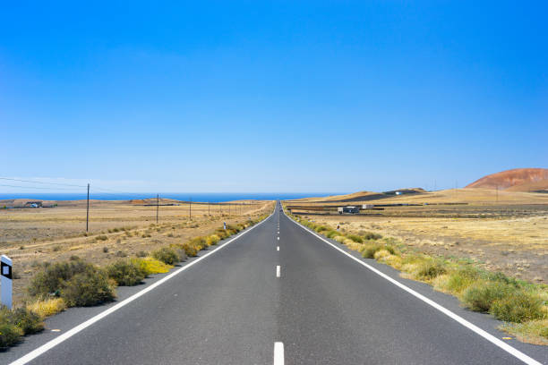 istock Quemada Beach, Road, Lanzarote, Spain 1157530564