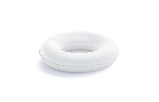 Blank white swim ring mockup isolated, side view, 3d rendering Blank white swim ring mock up isolated, side view, 3d rendering. Empty inflatable lifebuoy mockup for swimming . Clear safe rubber circle mock-up for beach, aquapark, cruise, ship template. inner tube stock pictures, royalty-free photos & images