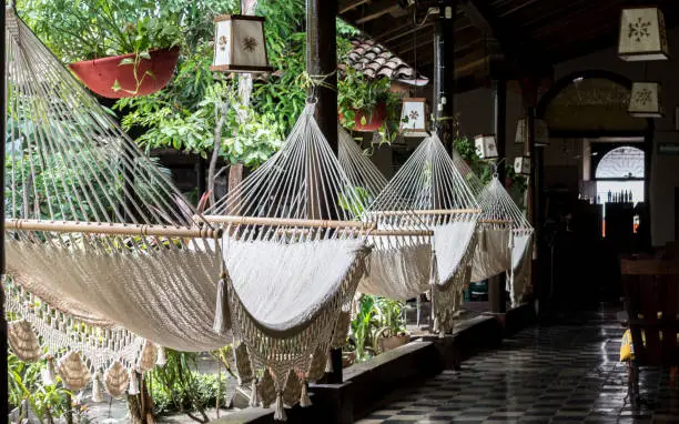 Photo of Leon, Nicaragua, September 2014: hammocks in a courtyard of a colonial hostel