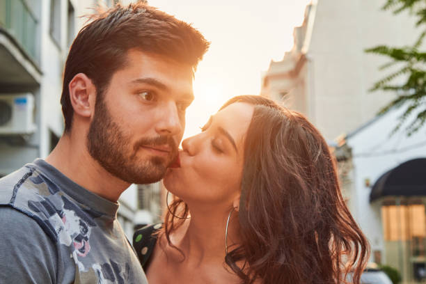 istock Cute young couple outdoors on the street. 1157541562