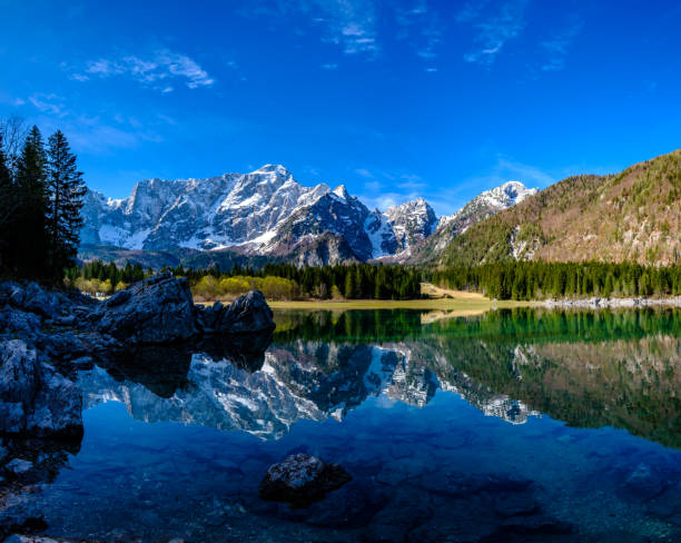 istock Spring morning at the alpine lake 1157541854