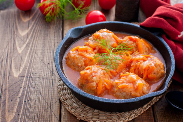 istock beef meatballs cooked with rice in tomato sauce decorated with basil 1157542775