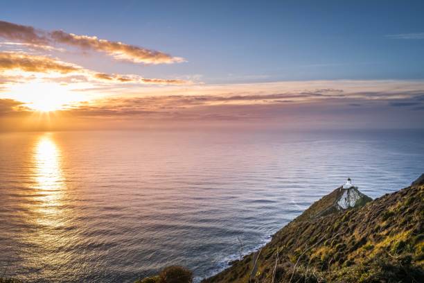 istock Nugget Point Lighthouse, Catlins New Zealand 1157544009