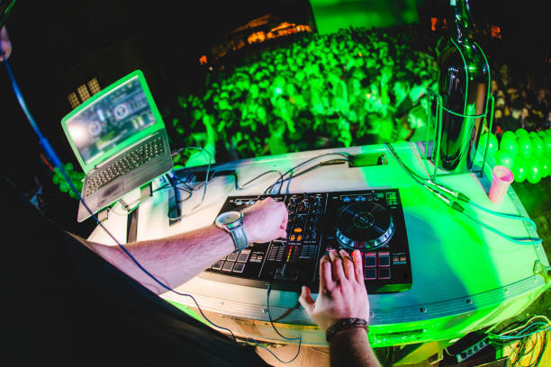 istock DJ playing and mixing music at party 1157544639