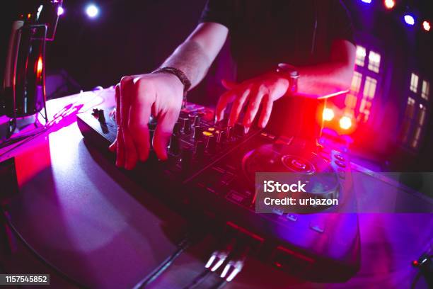 Dj Playing And Mixing Music At Party Stock Photo - Download Image Now - DJ, Party - Social Event, House