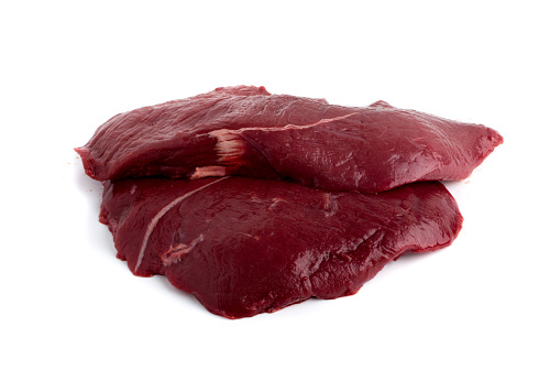 Fresh Deer Meat or Venison Isolated on White Background. Raw Venison Fillet Top View