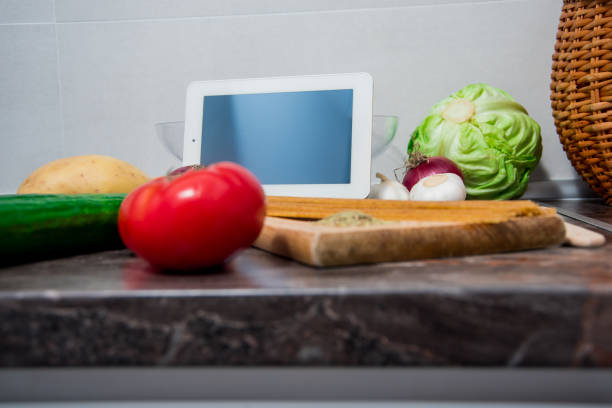 istock Vegetables on kitchen counter prepared for making delicious vegetarian meal 1157551526