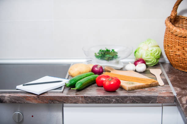istock Vegetables on kitchen counter prepared for making delicious vegetarian meal 1157551594