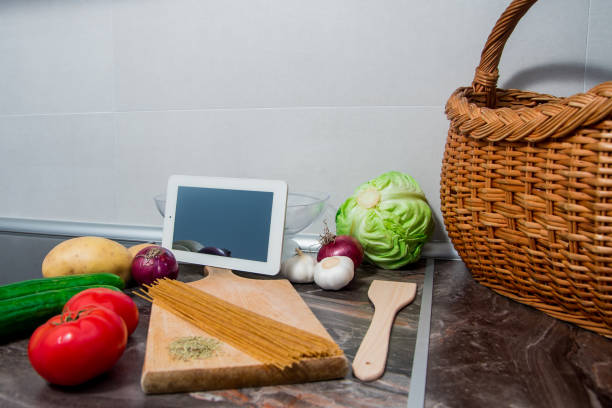 istock Vegetables on kitchen counter prepared for making delicious vegetarian meal 1157551757
