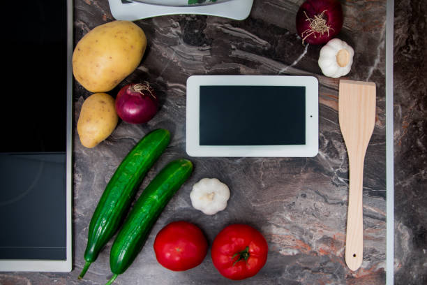 istock Vegetables on kitchen counter prepared for making delicious vegetarian meal 1157551808