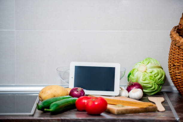 istock Vegetables on kitchen counter prepared for making delicious vegetarian meal 1157551812