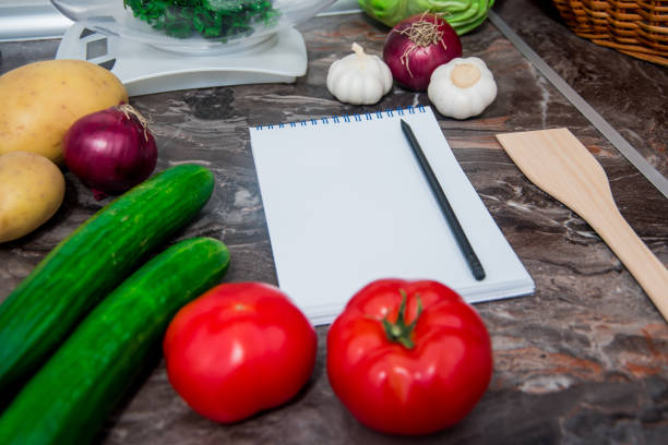 istock Vegetables on kitchen counter prepared for making delicious vegetarian meal 1157551820