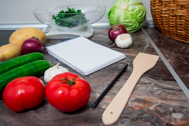 istock Vegetables on kitchen counter prepared for making delicious vegetarian meal 1157551849