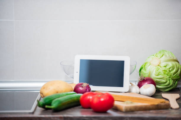 istock Vegetables on kitchen counter prepared for making delicious vegetarian meal 1157551872