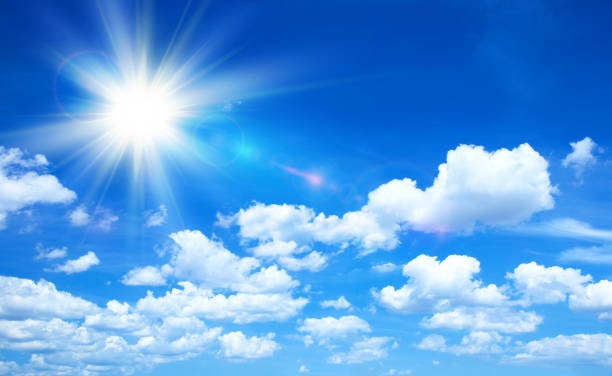 istock Sunny background, blue sky with clouds and sun 1157553696