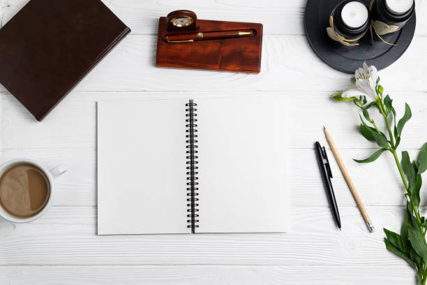 istock Composition with office education stationary notebook pen pencil coffee flowers 1157555152