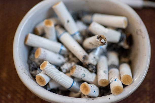 istock Cigarette butts in ashtray 1157556667