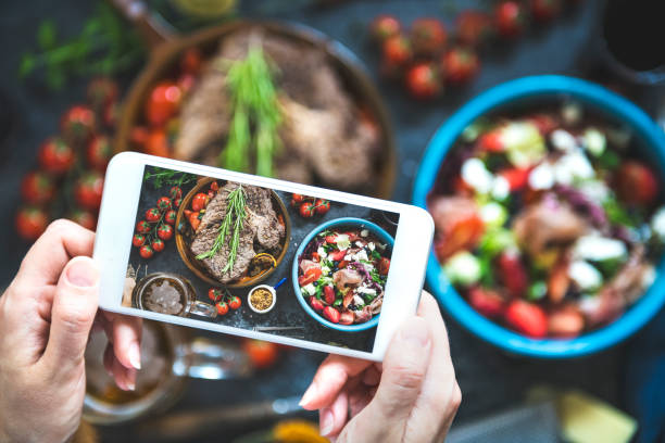 istock Taking photo of dinner table 1157556838