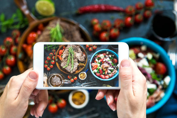 istock Taking photo of dinner table 1157556982