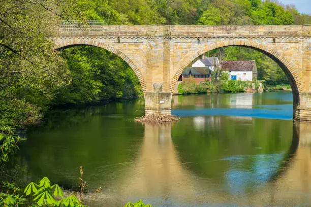 Prebends Bridge, one of three stone-arch bridges crossing River Wear in the centre of Durham, United Kingdom.