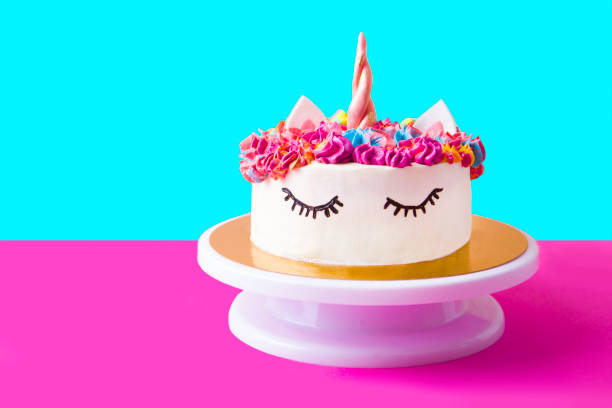 cake a unicorn on a pink background