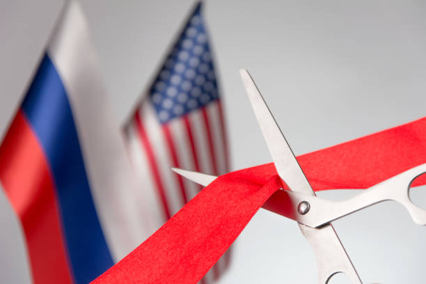istock nRussian and USA flag bluered on the background 1157564990